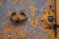 Close up of rustic old door with cracked red paint and grunge Royalty Free Stock Photo