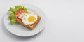 Close up of rustic savory bacon and egg waffle. Traditional breakfast idea. Egg toast for breakfast Royalty Free Stock Photo