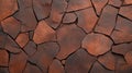 A close-up of a rustic stone wall with irregular, brown stones. The texture is rough and uneven, perfect for backgrounds or design Royalty Free Stock Photo