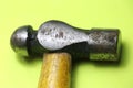 Close up of ball peen hammer with wooden handle Royalty Free Stock Photo