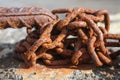 Rusty iron chain of an abandoned boat Royalty Free Stock Photo