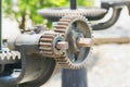 Close up ,rusty cogwheel metal mechanical gear on the floodgate background