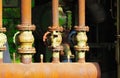 Landschaftspark Duisburg, Germany: Close up of rusty corroded tube construction with valves