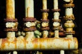 Landschaftspark Duisburg, Germany: Close up of rusty corroded tube construction with valves