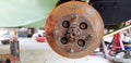 Close up rusty disc brake of car for repair or maintenance at garage