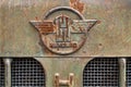 Close-up of rusty emblem on Hanomag brand tractor