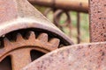 Close up of rusty gear on abandoned farm equipment