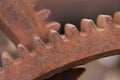 Close up of rusty gears lying on top of each other on a machine Royalty Free Stock Photo