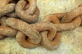 Rusty iron chain on gray background Royalty Free Stock Photo