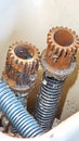 Close-up of rusty mechanical gears and springs