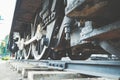 Close up of the rusty wheel train on the railway track Royalty Free Stock Photo