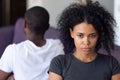 Close up sad African American woman after family quarrel with man Royalty Free Stock Photo