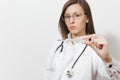 Close up sad doctor woman in medical gown with stethoscope, glasses. Focus on clinical thermometer with high fever Royalty Free Stock Photo