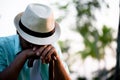 Close up sad elderly asian old man lost in thought sitting in park. Senior healthcare concept Royalty Free Stock Photo