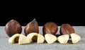 Close up salak fruit sliced with black background on grey stone Royalty Free Stock Photo