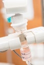 Close up saline IV drip for patient and Infusion pump in hospital Royalty Free Stock Photo