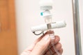 Close up saline IV drip for patient and Infusion pump in hospital Royalty Free Stock Photo