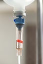 Close up saline IV drip for patient and Infusion pump in hospital Royalty Free Stock Photo