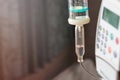 Close up saline solution drip and infusion pump Royalty Free Stock Photo