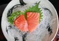 Close-up Salmon raw slice or salmon sashimi in Japanese style fresh serve on ice Royalty Free Stock Photo