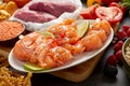 Salmon skewers and assorted healthy paleo foods