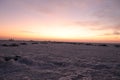 Close-up of salt marsh at Rann of Kutch with setting sun in the background- Rann utsav - white desert - Gujarat tourism - Twilight Royalty Free Stock Photo