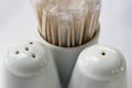 Salt and pepper shakers and toothpicks on restaurant table Royalty Free Stock Photo