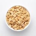 Close up of Salted Peanuts Indian namkeen snacks on a ceramic white bowl.