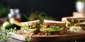 Close up of sandwiches with avocado in kitchen at home, copy space 1