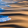 A close-up of a sandy beach with ocean waves1, Generative AI Royalty Free Stock Photo