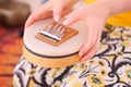 Close up of a sansula sound instrument played during a sound healing therapy healing session. ion. Royalty Free Stock Photo