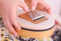 Close up of a sansula sound instrument played during a sound healing therapy healing session. ion. Royalty Free Stock Photo