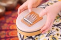 Close up of a sansula sound instrument played during a sound healing therapy healing session. ion. Royalty Free Stock Photo