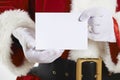 Close Up Of Santa Claus Holding Blank Invitation Royalty Free Stock Photo