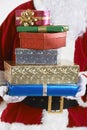 Close Up Of Santa Claus Holding Pile Of Gift Wrapped Presents Royalty Free Stock Photo