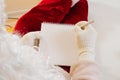 Close-up. Santa Claus writes a letter in a notebook. Place for text Royalty Free Stock Photo