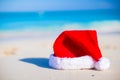 Close up Santa hat on a white sandy beach Royalty Free Stock Photo