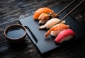 Close up of sashimi sushi set with chopsticks and soy