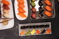 Close up of sashimi sushi set with chopsticks and soy - sushi roll with salmon and sushi roll with smoked eel Royalty Free Stock Photo