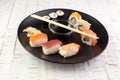 close up of sashimi sushi set with chopsticks and soy Royalty Free Stock Photo