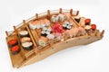 close up of sashimi sushi set with chopsticks and soy on a serving tray