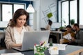 Close up of satisfied businesswoman answering email Royalty Free Stock Photo