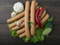 Close up of sausage and fresh vegetables Royalty Free Stock Photo