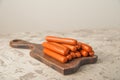 Close-up of sausages. Sausages on the blackboard and place for text. Boiled raw bavarian sausages and copy space Royalty Free Stock Photo