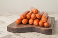 Close-up of sausages. Sausages on the blackboard and place for text. Boiled raw bavarian sausages and copy space Royalty Free Stock Photo