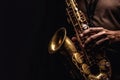 Close up of Saxophone Player hands Saxophonist playing jazz music. Alto sax musical instrument on black background. Generative Ai Royalty Free Stock Photo