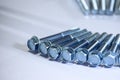 Close up scene the group of galvanize bolts with hexagon head with thread for use with nuts Royalty Free Stock Photo