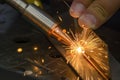 Close up scene the laser welding process with the sparking light Royalty Free Stock Photo