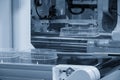 Close up scene material handling process the food container by robotic system from injection machine