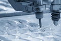 Close-up scene of multi-axis abrasive waterjet cutting machine cutting the aluminum plate